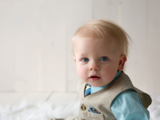 Lexington, KY baby photographer picture of a baby boy in a blue suit