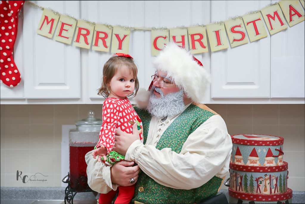 Kentucky ASL Santa holding little girl during Santa Mini Sessions