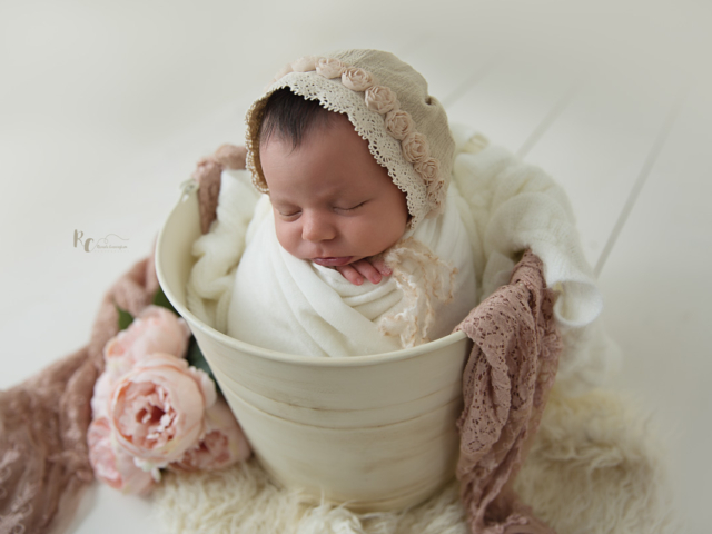 Newborn portrait of baby in a vitage shabby chic bucket by Rhonda Cunningham Photography, Lexington Ky newborn photographer